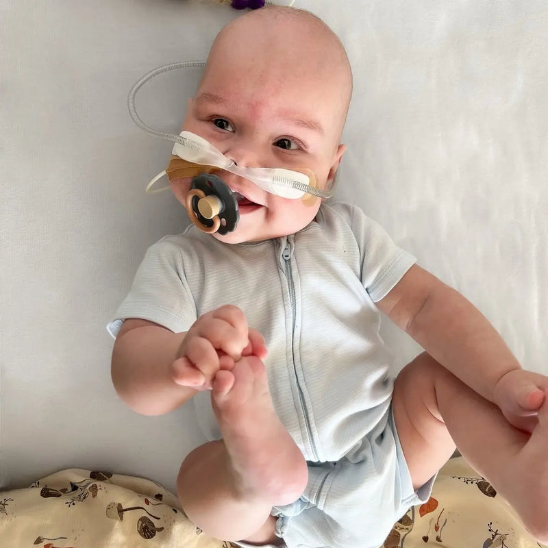 lukas-with-frigg-pacifier.webp